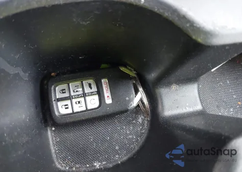 2021 Honda Odyssey Elite z USA, uszkodzony, nr VIN 5FNRL6H92MB011917